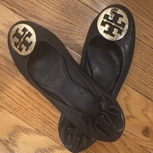 Tory Burch Black Flats with Gold Emblem